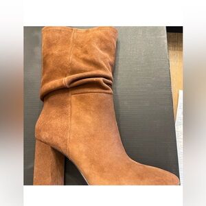 Banana Republic Suede Heeled Boots color more like “luggage”.  Great neutral.